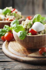 Vegetarian salad with quinoa, tomato and avocado