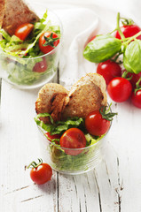 Vegan healthy salad with tomato, lettuce and bread