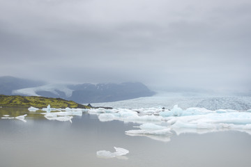 Glacial river lagoon.  Blue icebergs. Jokulsarlon glacier lake. Vatnajokull National Park. Iceland. August. © serg_did