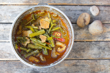 Pork curry with water spinach (Tae-pho soup) in tiffin carrier