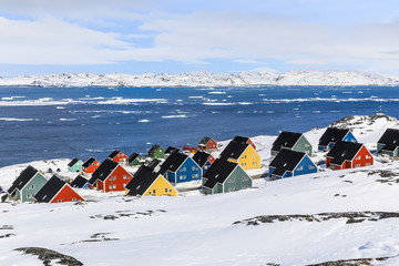 Colorful inuit houses in a suburb of arctic capital Nuuk - obrazy, fototapety, plakaty
