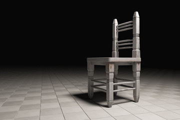 Wooden chair abandoned in empty room