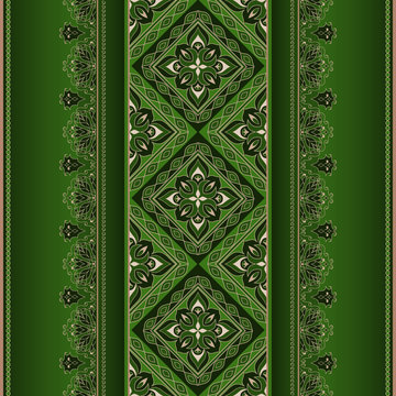 Filigree lase golden border on a green background.