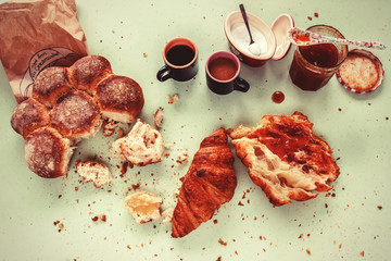 French breakfast with croissants. Vintage toned photo, soft focus.