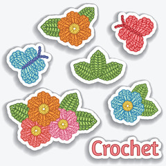 Set of crochet elements. Flowers, butterflies, leaves. Crochet stitches.