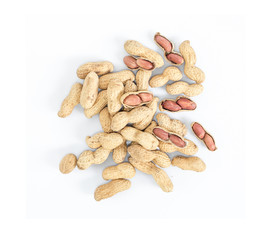 Dried peanuts in closeup on white