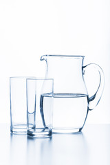jug and glass on a white background.