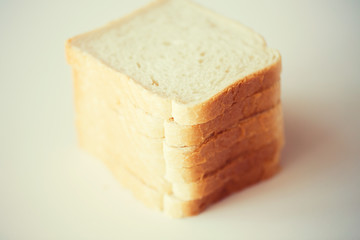 close up of white toast bread on table