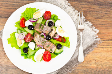 Salad with Lettuce, Tomatoes, Cucumbers and Canned Tuna