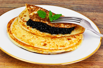 Pancakes with Black Caviar