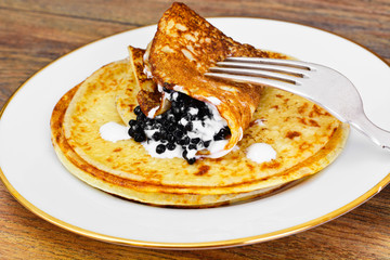 Pancakes with Black Caviar