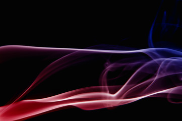 Real photographed abstract smoke on black background.