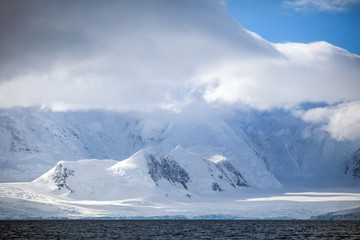 Landscapes Antarctica beautiful snow-capped mountains against the cloud sky