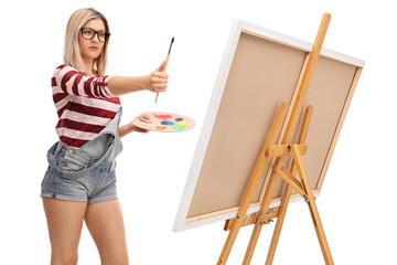 Female artist measuring proportions