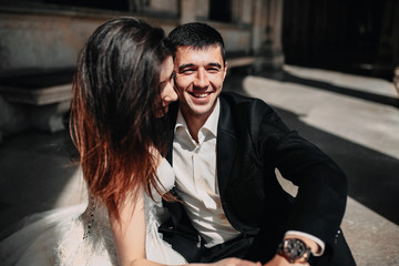  Brides embrace in the hall