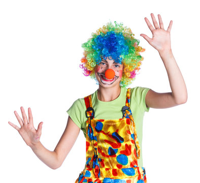 Girl dressed as a clown isolated