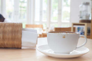 Fototapeta na wymiar Latte Coffee art on the wooden table