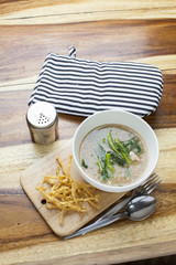 Fried noodle in Gravy on wooden background
