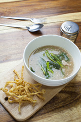 Fried noodle in Gravy on wooden background