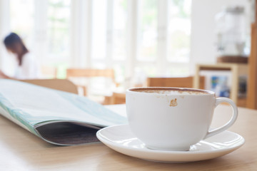 Latte Coffee art on the wooden table