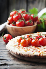Italian homemade pizza margherita with tomato