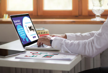 businessman laptop office insurance comparator