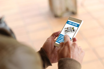 Brown young man smartphone home automation