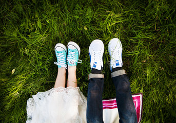 Legs bridal, groom wearing shoes