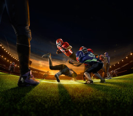 Naklejka premium american football players in action on grand arena