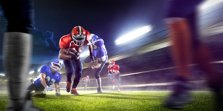 american football players in action on grand arena