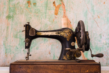 old vintage sewing machine grunge background