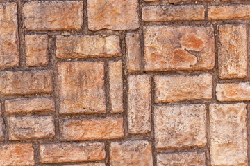 Closeup of coloful brick patterns and textures on  wall