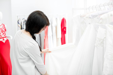  bride selects the wedding dress
