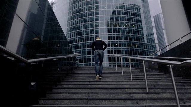 Businessman going up.