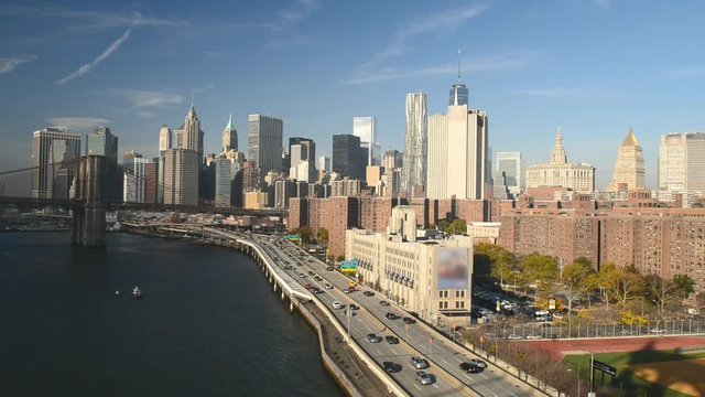 FDR Drive traffic and cars on a sunny day, all ads removed. New York aerial view