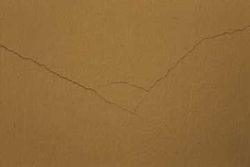 cracked on a brown cement background