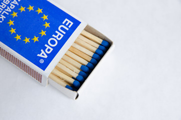 Matchstick in blue box on isolated background