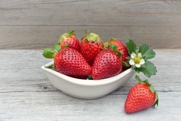 Strawberry on wood background. Red strawberries. 
