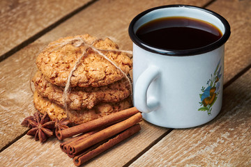 Metal cup, spices and cookies