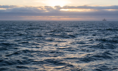 Sea waves during sunset.