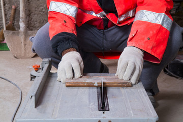 carpenter at work in a building site