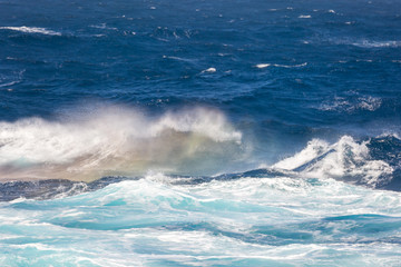 Waves splashes and rainbow