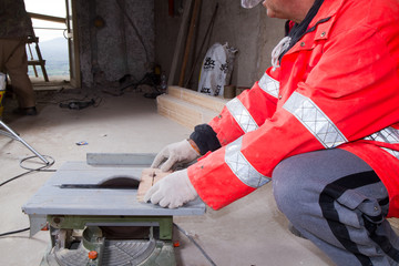 carpenter at work in a building site