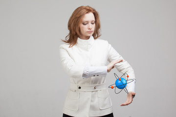 Woman scientist with atom model, research concept