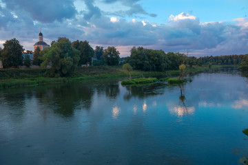 Fototapeta na wymiar Beautiful summer sunset in the river