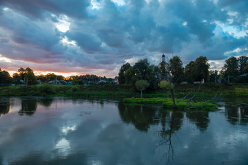 Fototapeta na wymiar Beautiful summer sunset on the river