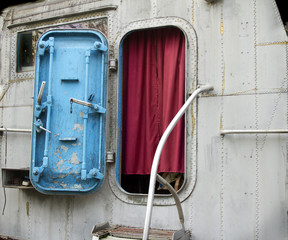 entrance to the wheelhouse of the old military boat © valeie
