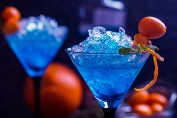 Blue cocktail in martini glasses