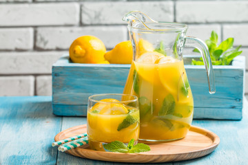 Lemonade in the jug and glass