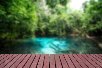 Close up wooden table with seascape blurred background